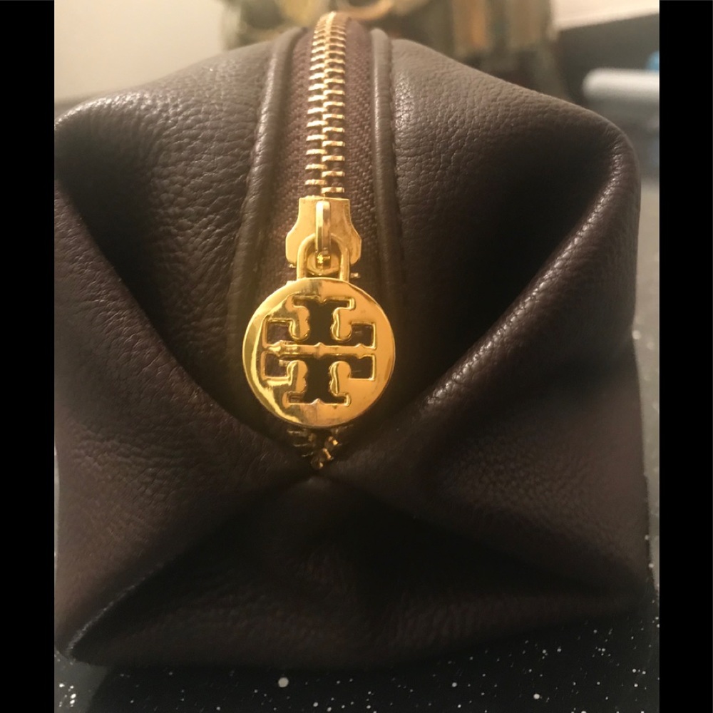 100% Tory  Burch Brown cosmetic bag.